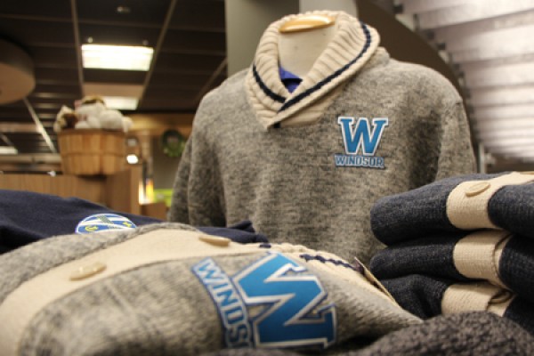 display of sweaters, some with UWindsor logos