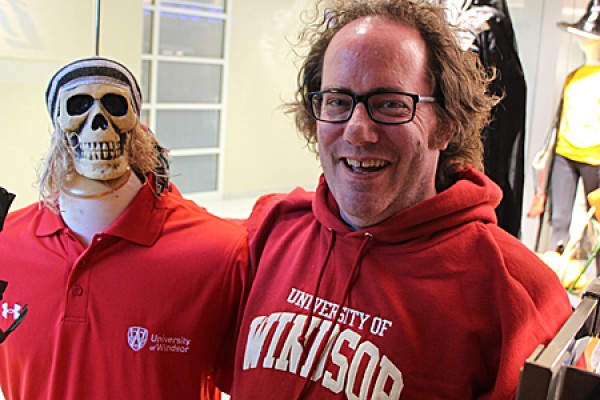 Martin Deck poses with a mannequin