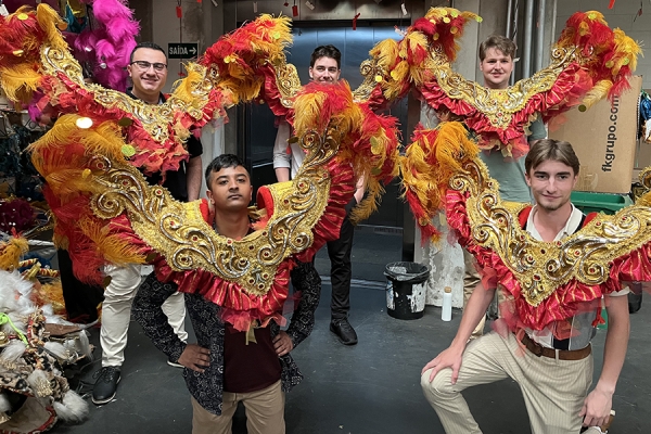 Students try on costumes at the samba school in Sao Paulo.