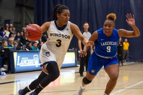 Lancer guard Kayah Clarke evades Lakehead’s Tiffany Reynolds.