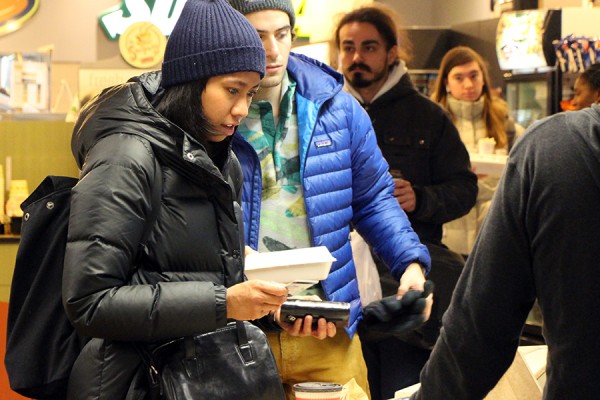 student at cash in Marketplace