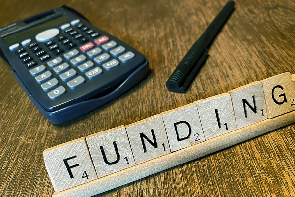 scrabble tiles spelling &quot;funding&quot;