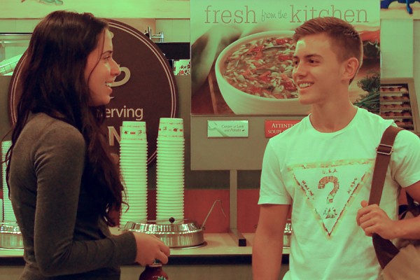 Two students standing in front of hot soup counter.