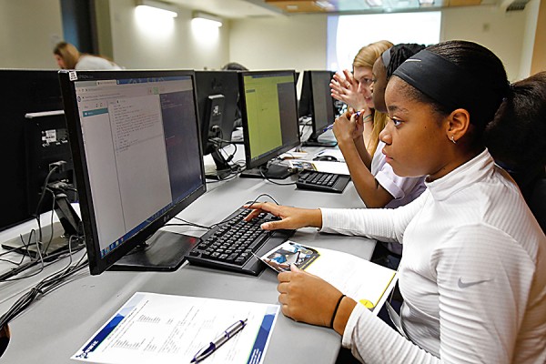 young women working at computers in 2020