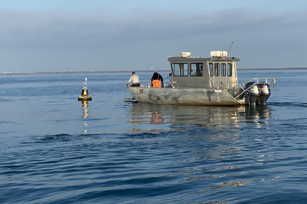 boat draws near to buoy