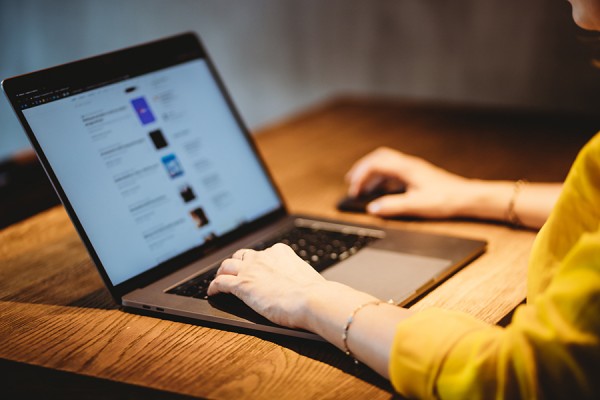 person working on laptop computer