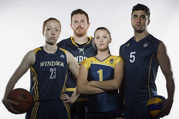 Emily Prevost, Ryan Green, Emily McCloskey and Andre Khayat in Lancer uniforms