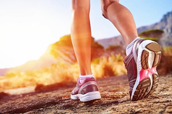 photo of legs walking along path