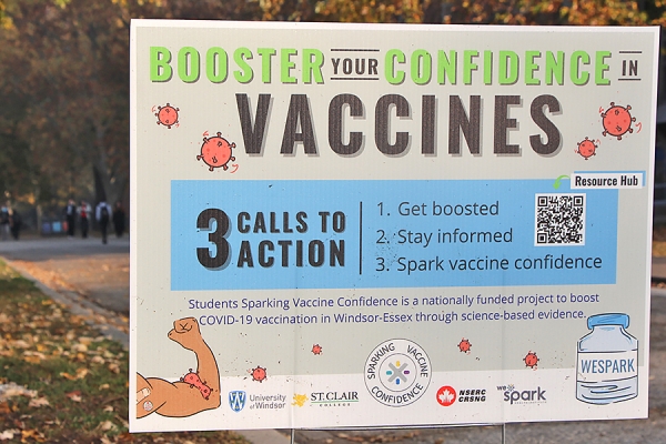 “Booster your confidence in vaccines” sign