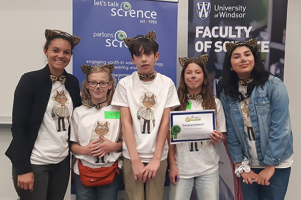 Cat Chemists students wearing kitten ears and whiskers