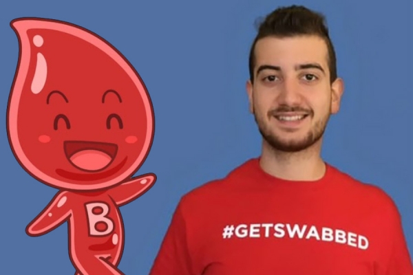 young man wearing get swabbed T-shirt