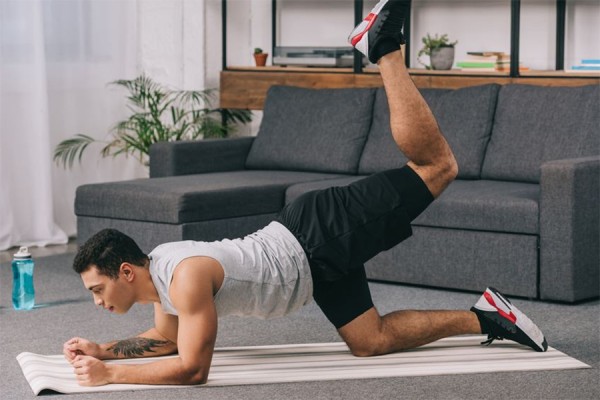 man performing fitness routine