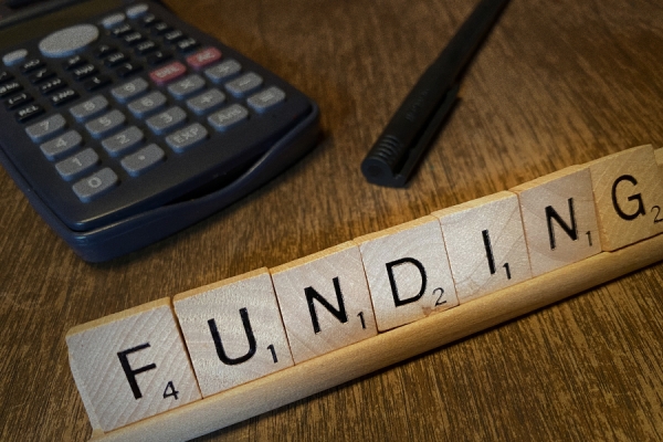 Scrabble tiles spelling &quot;Funding&quot;