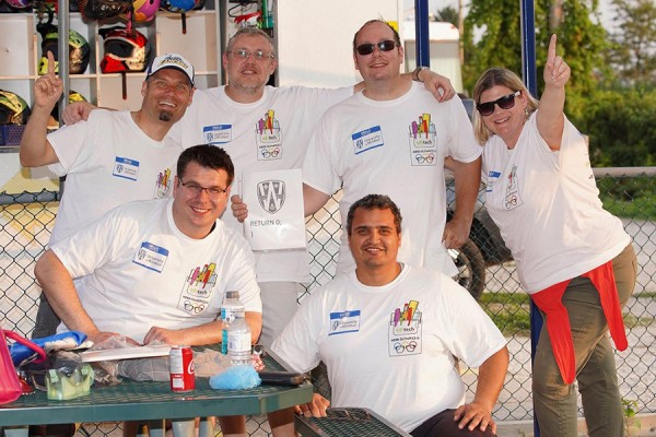 Standing are Kevin Macnaughton, Jason West, Eric Masse, and Melissa Robinet; seated are Mike Fisher and Sherif Saad.