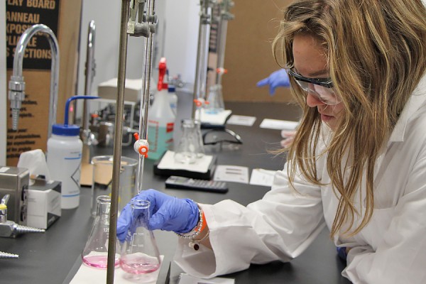 student works on a chemistry challenge during the 2016 Science Olympiad