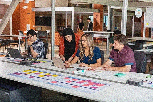 researchers at desk