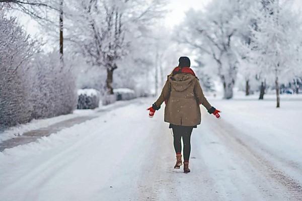 person walking in snowscape