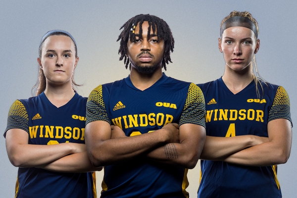 Natalie Hogeterp, Devin Hernandez, and Hailey Smith in soccer uniforms