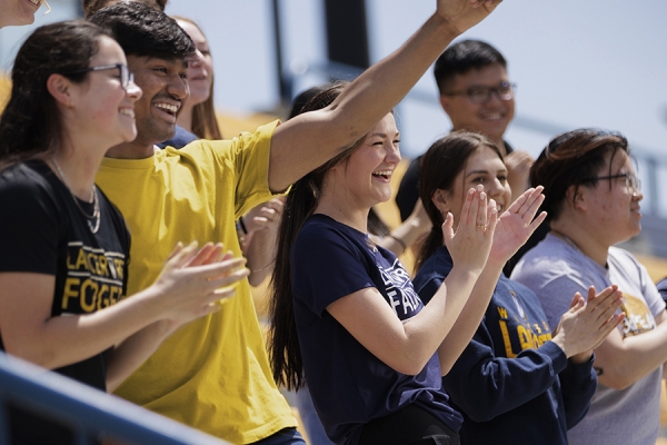 fans cheering in Alumni Stadium