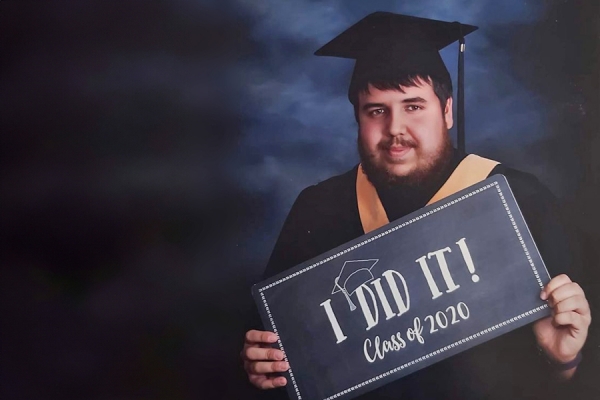 Stefan Stevic in graduation cap and gown