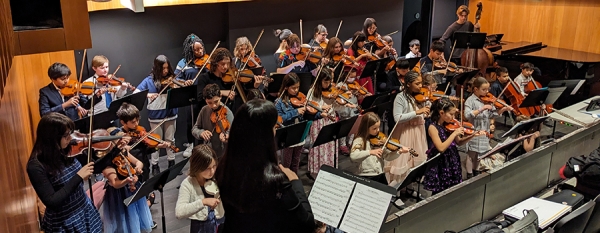 musicians in children&#039;s string section