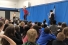 Alexa Monaco, Jaedyn Ellis, and Max Farley on stage in front of audience of kids