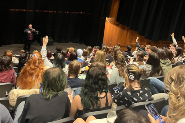 Vincent Georgie at front of lecture hall