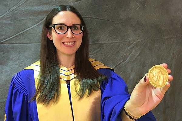 Christine Madliger holding the Governor General’s Gold Medal