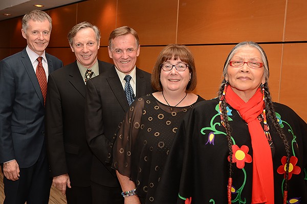 UWindsor president Alan Wildeman congratulates Clark Award honourees Tom Porter, Tony Doucette, Carol Reader and Mona Stonefish.