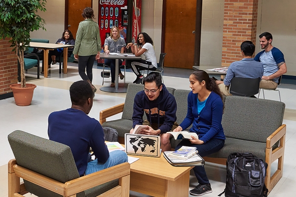 students sitting in group discussion