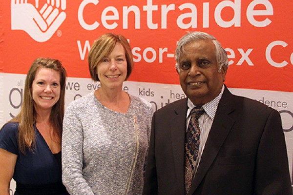 Sheri Lowie and Datta Pillay flank Alison Samson