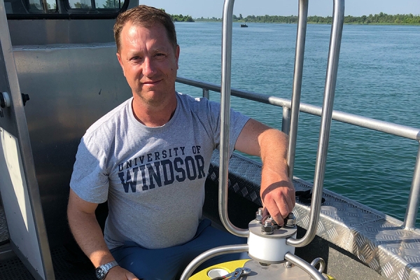 Trevor Pitcher making an adjustment on a buoy.