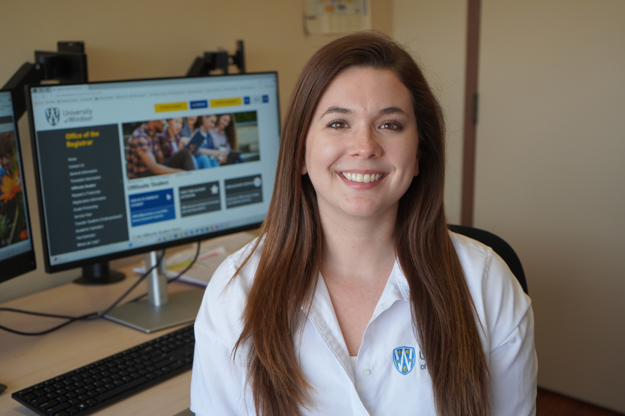 Sydney Kirsch, Student Success Coordinator sitting in her office