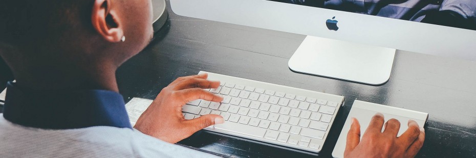 Student uses computer keyboard. 