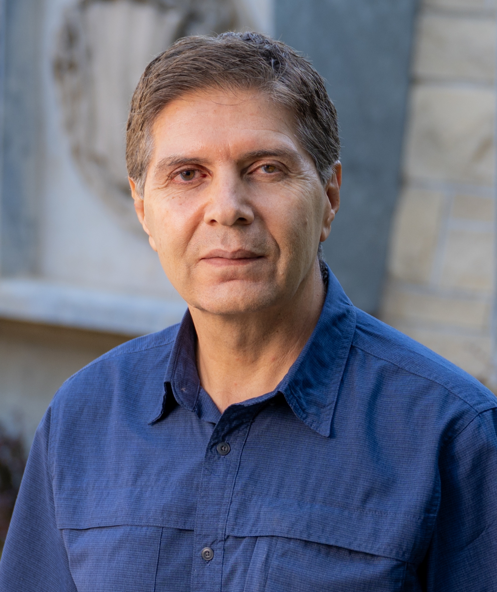 Dr. Reza Riahi