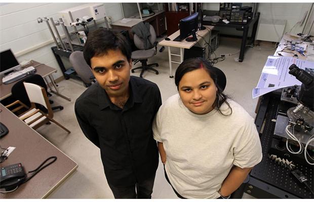 Kaushik Ray (left) and Ashirbani Saha (right) are photographed in their lab 