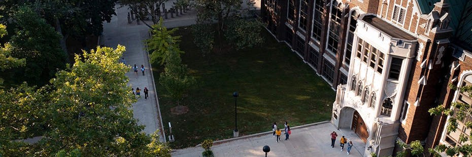 Drone view of Dillon Hall and quad with students