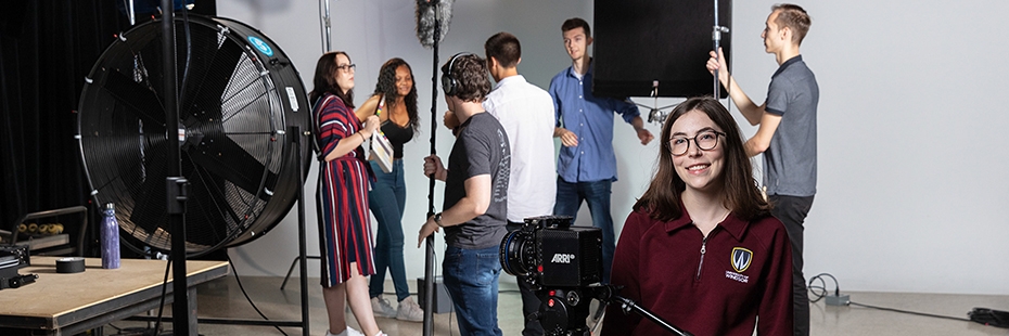 Students prepping to shoot a scene in the film studio