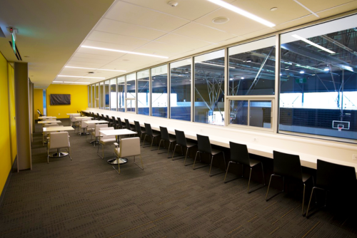 Alumni Lounge overlooking the triple gymnasium. 