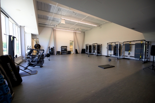 Multipurpose room with fitness equipment 