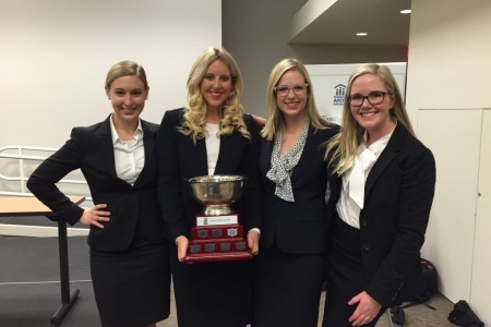 Walsh Family Moot team members Lesley Campbell, Mackenzie Falk, Rebecca Hines and Rebecca Locksley, along with their coach Cynthia Nantais  
