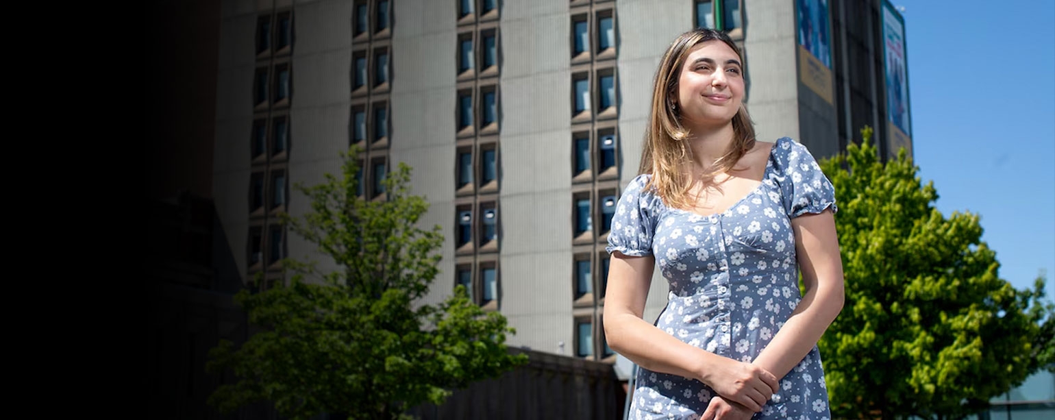 Nursing graduate Melissa Mastroianni stands outside Windsor Regional Hospital - Met Campus, where she has started a permanent position on the oncology ward, on June 14.