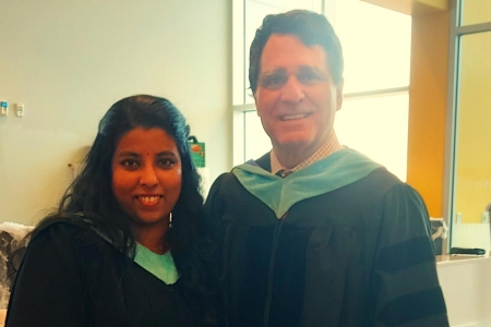 Dr. Smith with Thivya Sriramachandran at her M.Ed. graduation