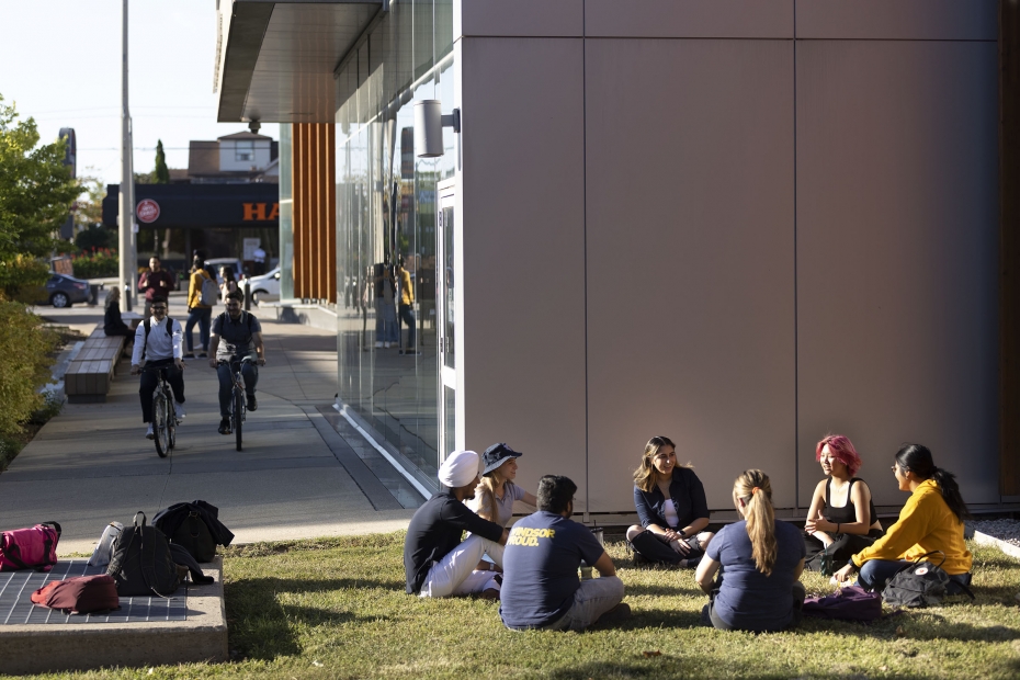 Students sit outside the University of Windsor&#039;s Centre for Engineering Innovation