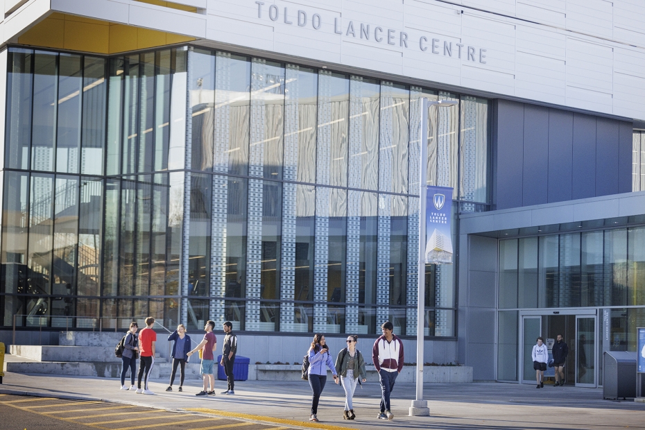 Students walk outside of the University of Windsor&#039;s Toldo Lancer Centre