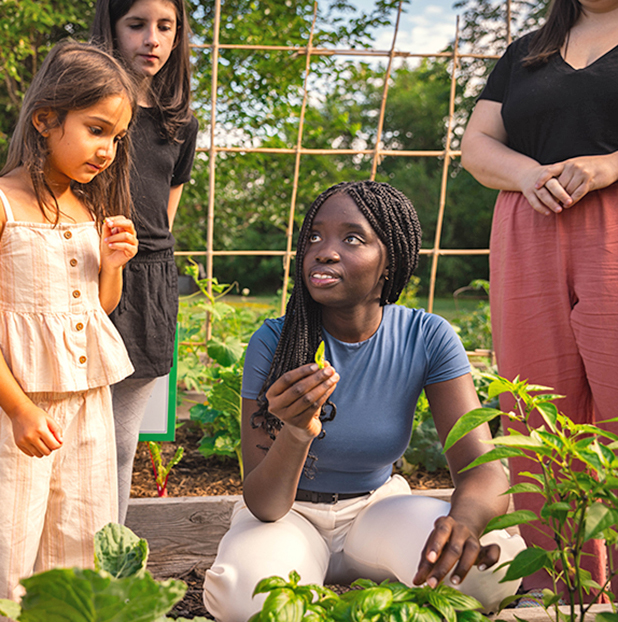 teacher candidate educating in garden