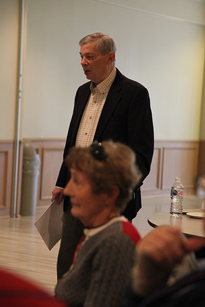 Wilf Innerd with Barbara Thomas in the foreground. 