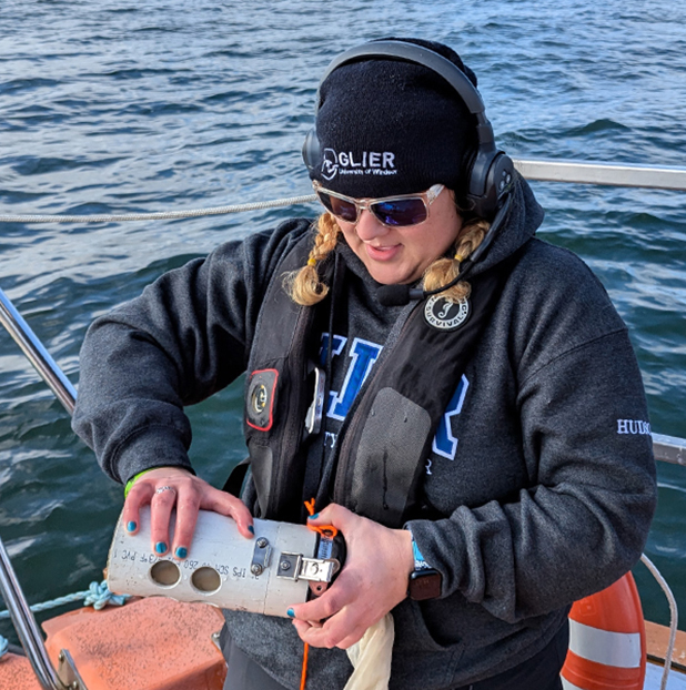 Neve Hudson sampling lake waters