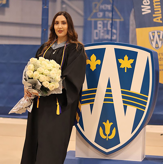 M.Eng grad wearing honour roll cord