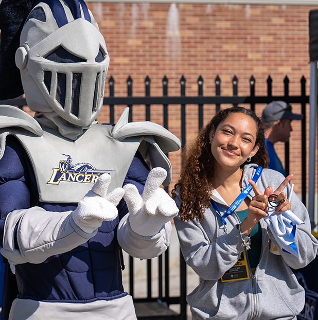 mascot sharing moment with fan